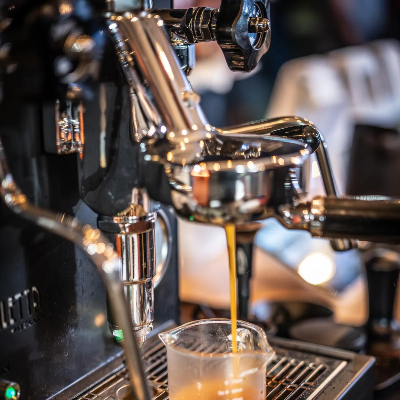 Espresso being pulled on the mobile espresso bar at a Dallas–Fort Worth event